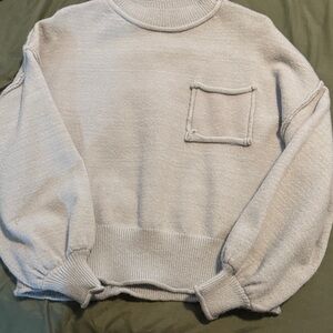Cozy Cream Sweater with Pocket